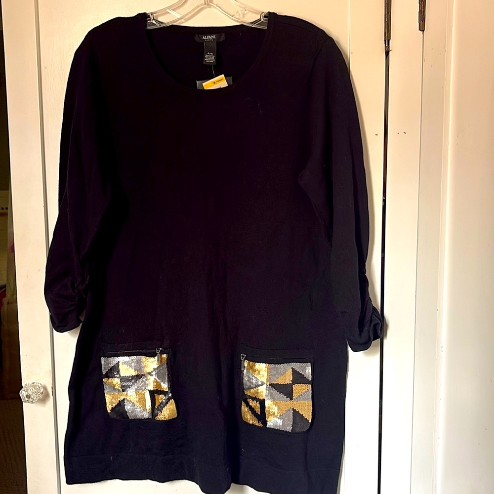 Sweater dress with sequin pattern zip front pockets